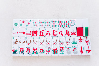 Set of Christmas-themed tiles with various designs on a light gray background